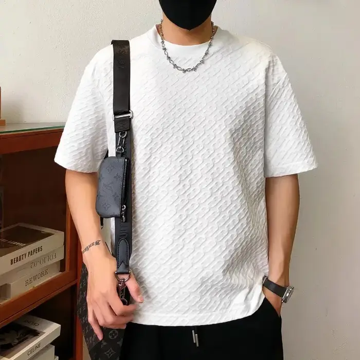 T-shirt d'été pour homme en jacquard texturé à manches courtes, col rond, ample, respirant, basique et décontracté