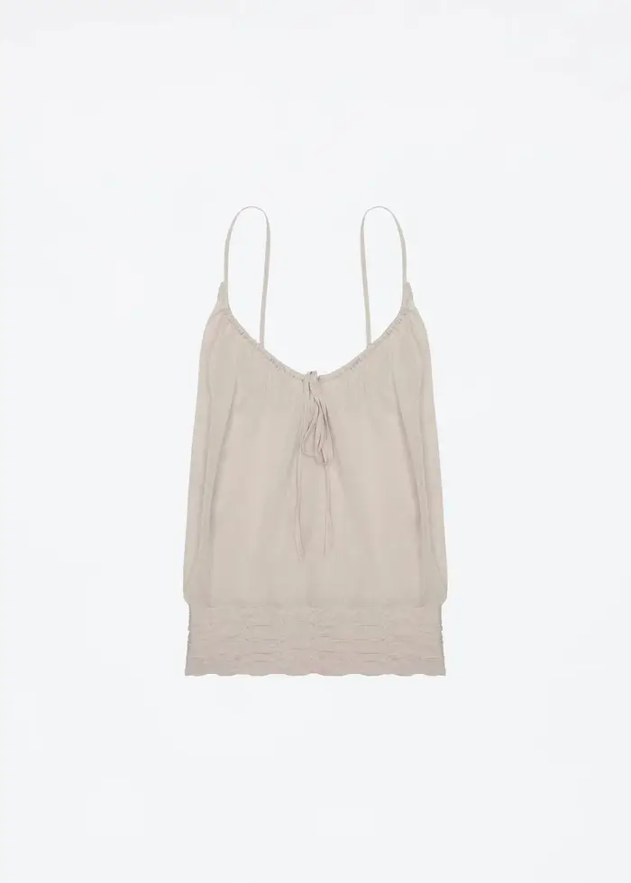 Débardeur beige clair semi-transparent en tricot ultra-fin