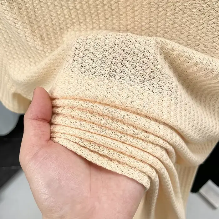 Polo homme à séchage rapide en tissu gaufré nid d'abeille