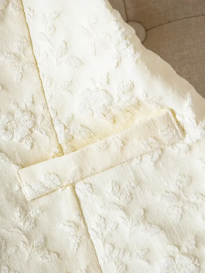 Gilet de costume décontracté en tissu texturé pour femme – Élégant et sans manches