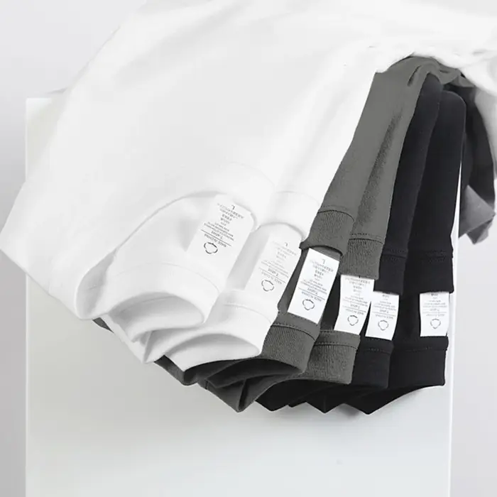 2 pièces 100% coton solide t-shirts hommes et femmes à manches courtes blanc