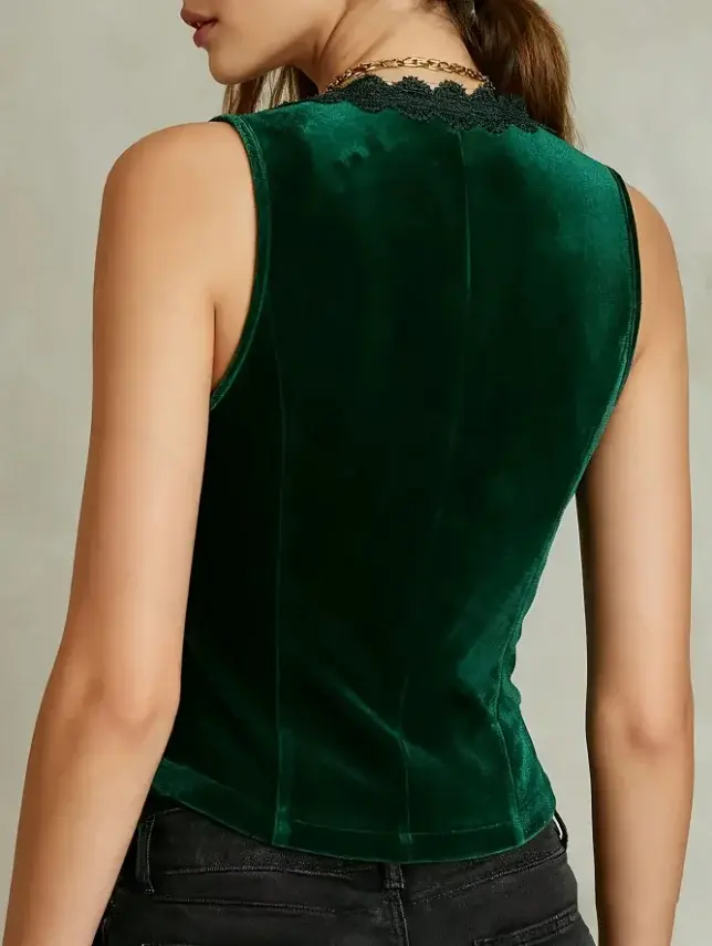 Gilet en velours à col en V pour femmes, avec bordure en dentelle et boutons décoratifs.