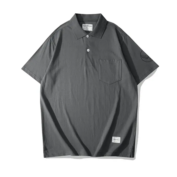 OKONKWO_200g POLO à manches courtes avec poche rétro_T-shirt