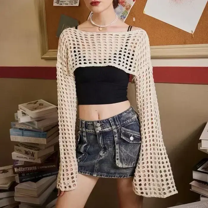 Printemps été court évider pull en tricot nouveau manches évasées couleur unie pulls Streetwear haut pour femme