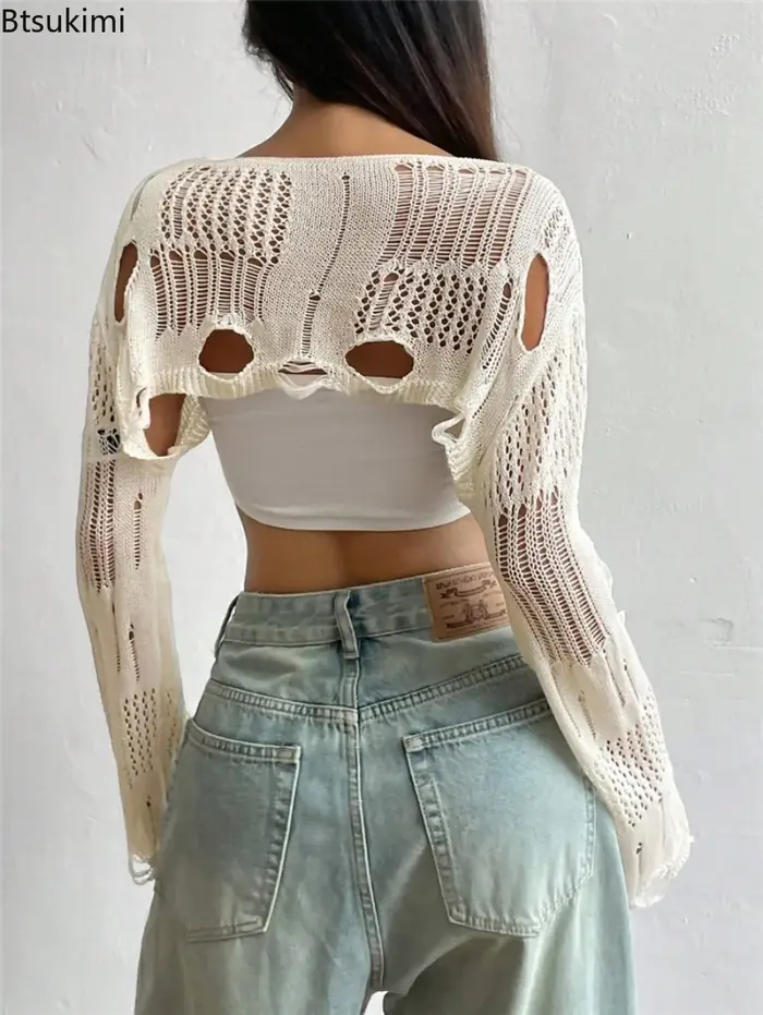 Femmes Sexy à manches longues voir à travers le crochet supérieur fleur trou creux tricoté Smock court pull femme
