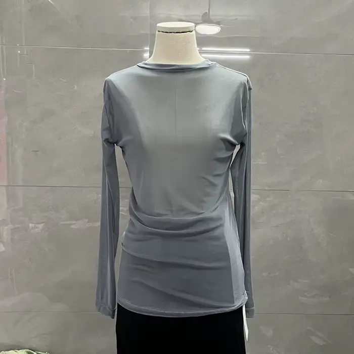 Chemise blanche à manches longues et col rond pour femme