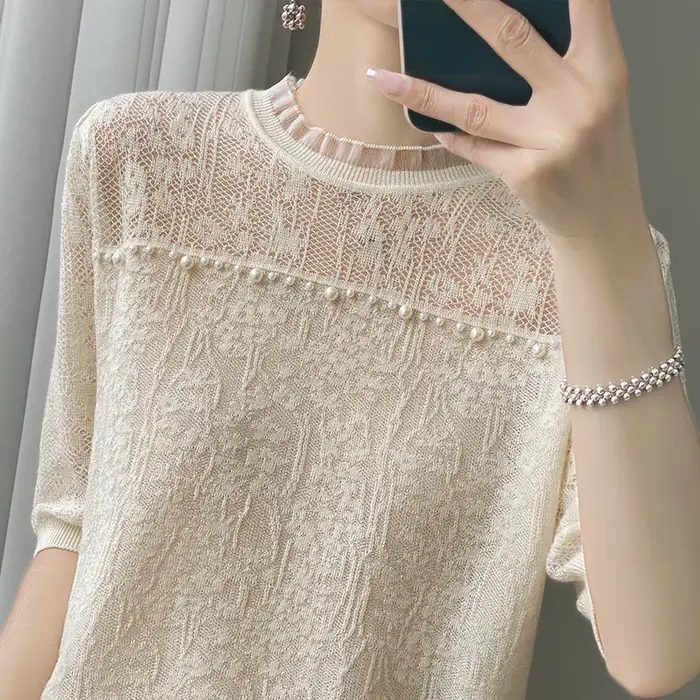 T-shirt en dentelle française pour femme, style estival ajouré à motif floral, haut à manches courte