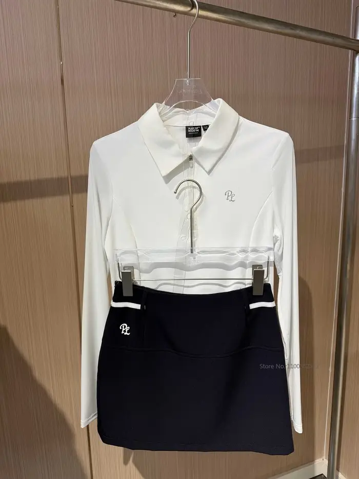 PL Polo de golf pour femme à col