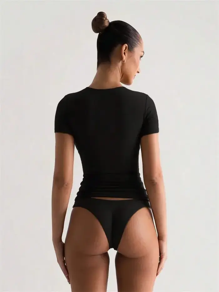 Couleur unie basique recadrée t-shirts pour femmes décontracté col rond à manches courtes haut court été coupe ajustée t-shirt Streetwear 2025