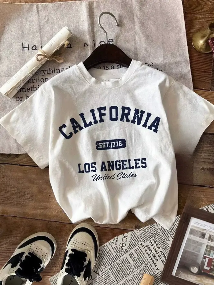 T-shirt d'été pour femme, style vintage américain, col rond, vêtements de mode de Los Angeles, haut décontracté streetwear pour femme