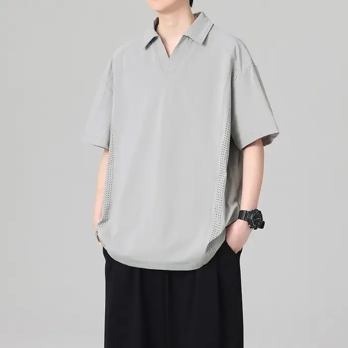 Polo pour homme à col cranté avec empiècements en maille
