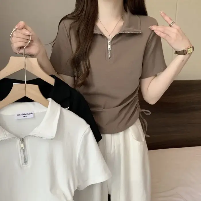 T-shirt polo pour femme à demi-zip