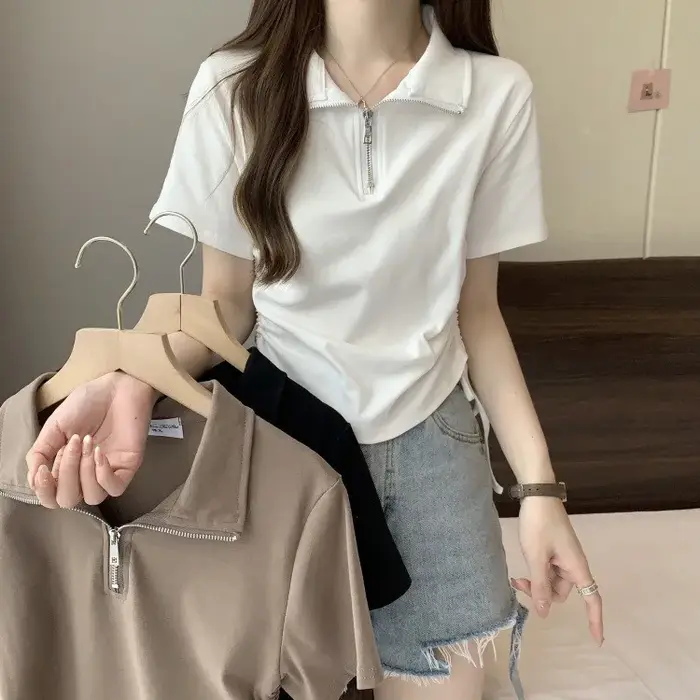 Polo mi-zippé pour femme