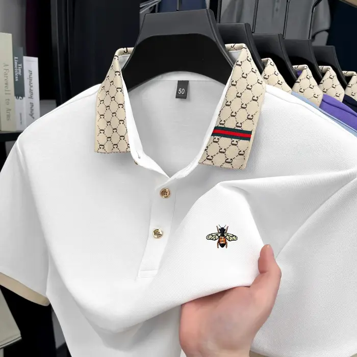 Polo à manches courtes de marque de luxe légère T-shirt à revers bloqué de couleur brodée d'abeille vêtements décontractés pour hommes nouvelle collection été