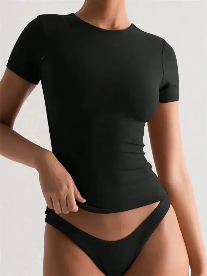 Couleur unie basique recadrée t-shirts pour femmes décontracté col rond à manches courtes haut court été coupe ajustée t-shirt Streetwear 2025