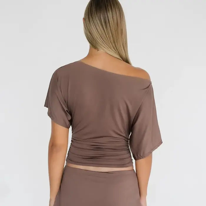 Haute qualité vente chaude en gros été nouveau T-shirt femme Sexy épicé fille plissée simple épaule col incliné haut ajusté