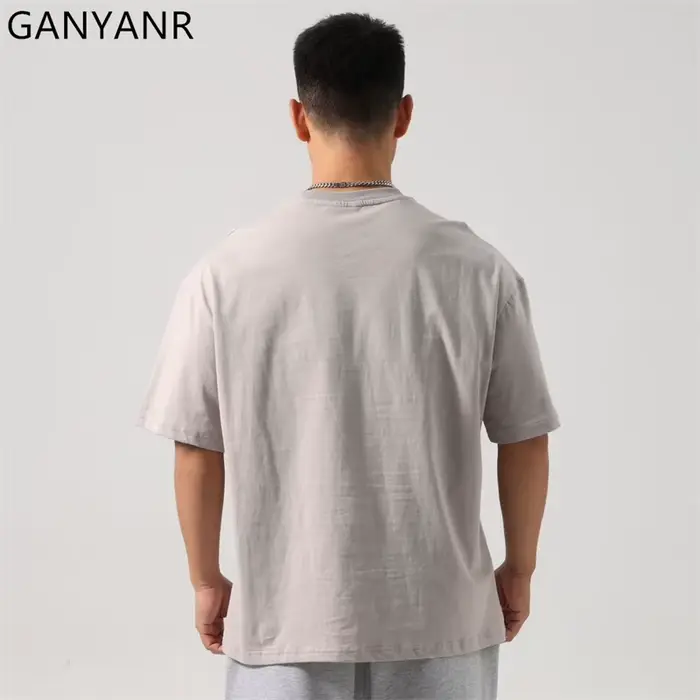 GANYANR T-shirt de course pour hommes vêtements de golf d'été Fitness actif à manches courtes musculation gymnase