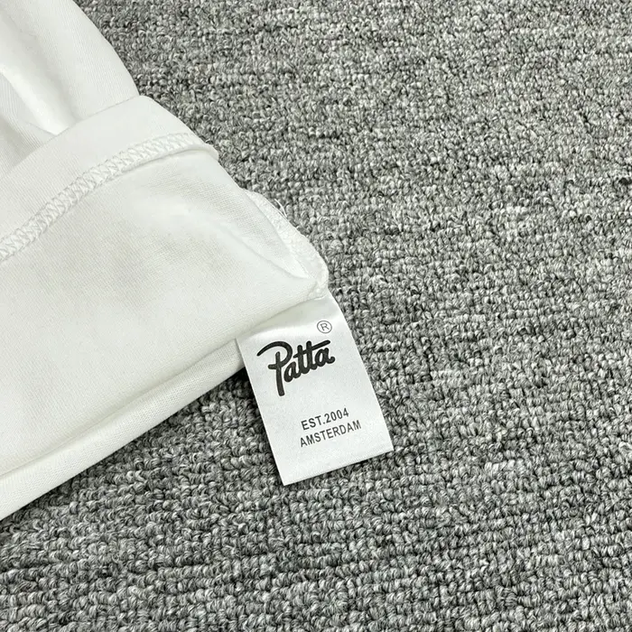 T-shirt classique Patta 26SS Nouvelle Collection – Homme/Femme – Coton ample décontracté – Imprimé lettres PATTA noir et blanc – Manches courtes