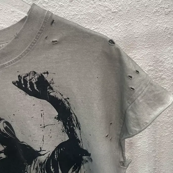 High Street sale endommagé trou dieu est un DJ débardeurs hommes femmes surdimensionné Saint manches-coupées T-Shirt