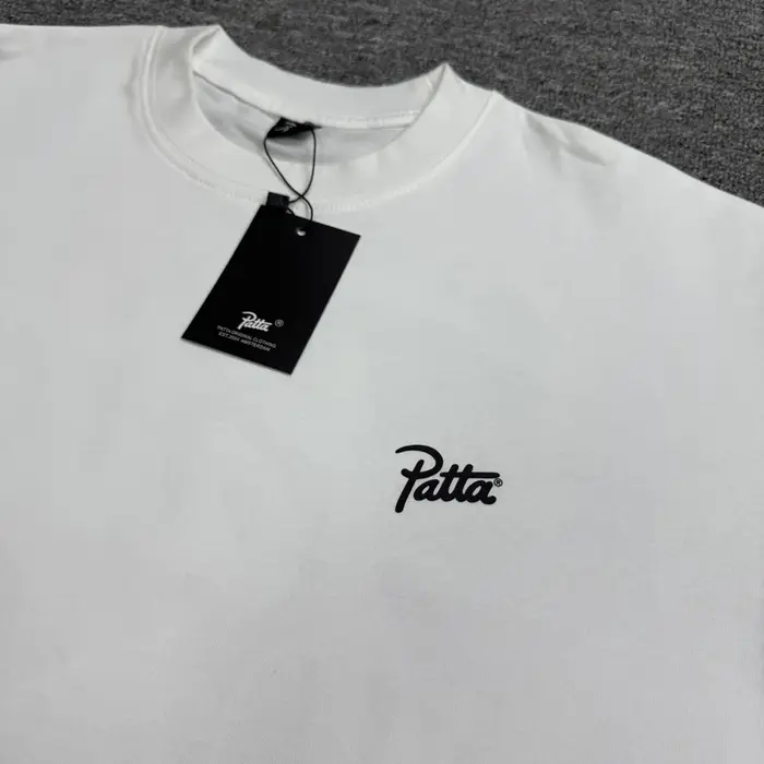 T-shirt classique Patta 26SS Nouvelle Collection – Homme/Femme – Coton ample décontracté – Imprimé lettres PATTA noir et blanc – Manches courtes