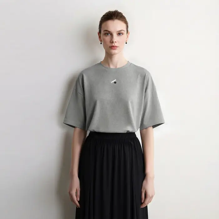 T-shirts pour femmes Amii, col rond, épaules tombantes, broderie géométrique, hauts amples d'automne