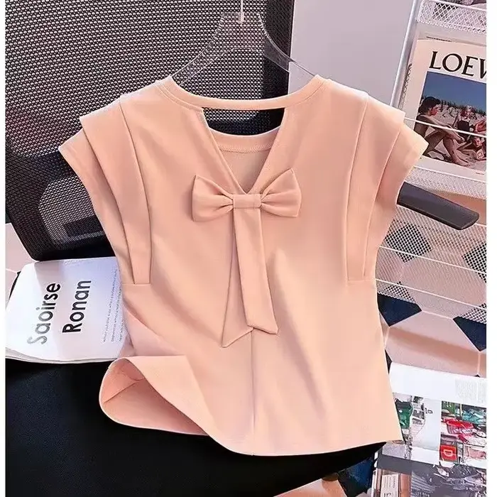 T-shirt français à manches bouffantes pour femmes, nouveau dos ajouré, chic, beau petit haut, été 2025
