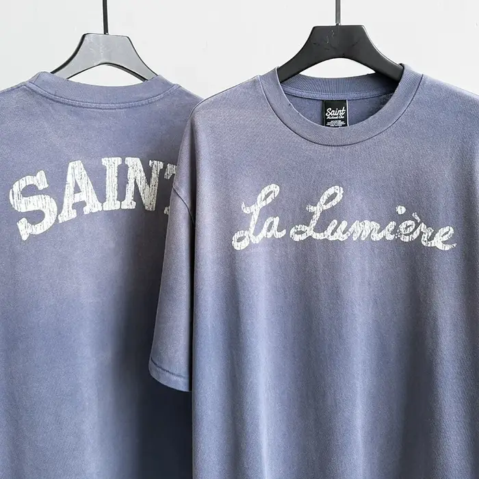 T-shirt décontracté unisexe Saint La Lumière avec logo imprimé lettres craquelées