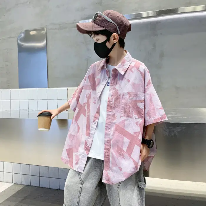 Chemise d'été élégante de couleur rose pour enfants