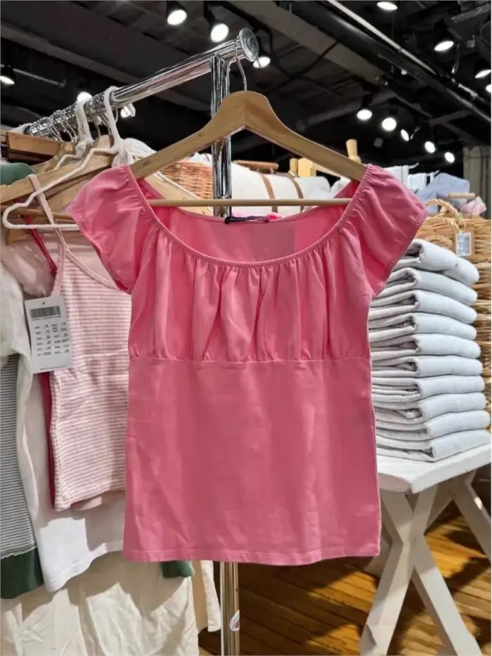 T-shirt rose en maille plissée à manches courtes pour femme