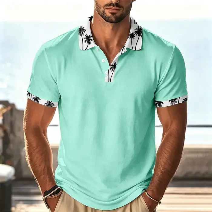Polo vert menthe pour homme avec col et poignets imprimés palmiers