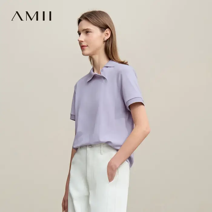 Polo Amii pour femme – Collection été 2026 – T-shirt décontracté à col revers et manches courtes avec patte de boutonnage asymétrique – Idéal pour superposer – Référence 12622015