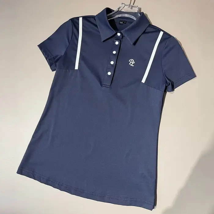 Tenues de golf pour femmes PL : Polo à manches courtes, jupe de golf à volants coupe trapèze, haut s