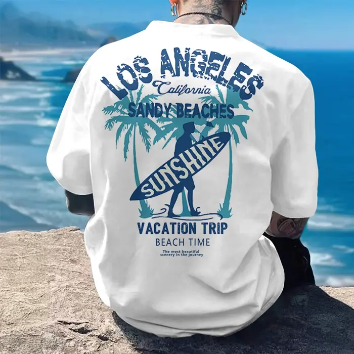 T-shirt pour homme en coton 100% avec imprimé graphique soleil et plage, style surf vibrant de Los A