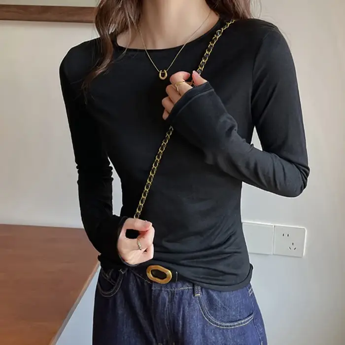 T-shirt gris à col rond et manches longues pour femme