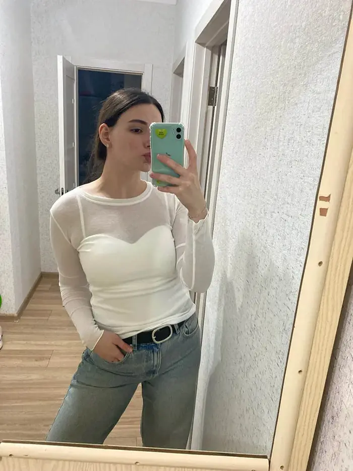 Haute qualité plaine T-shirt femmes coton élastique basique T-shirts femme décontracté hauts à manches longues Sexy