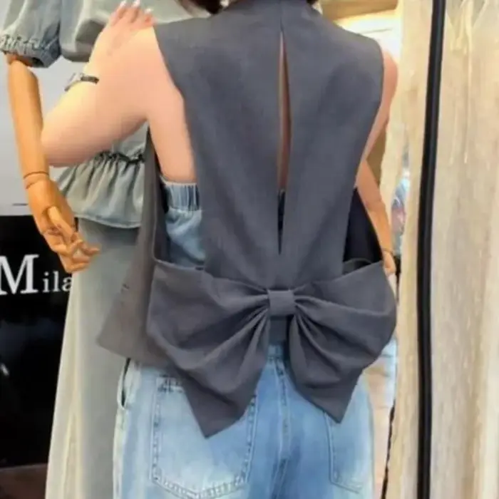 Gilet sans manches gris simple et tendance pour femme