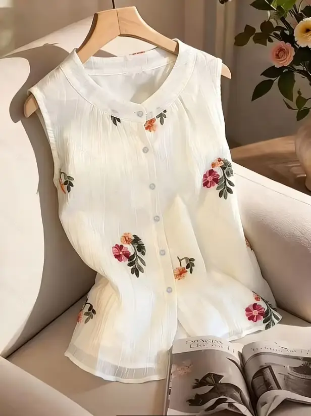 Nouvelle Blouse d'été sans manches à col rond brodée pour femme