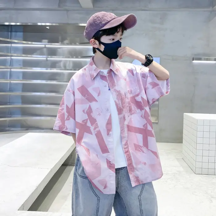 Chemise d'été élégante de couleur rose pour enfants