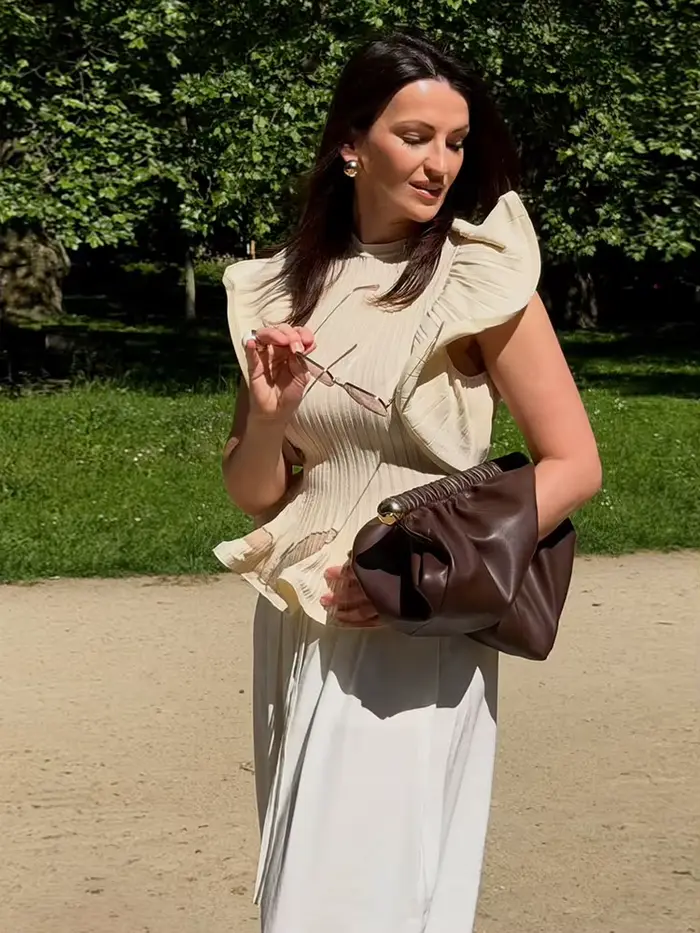 Hauts pour femmes en maille à volants sans manches