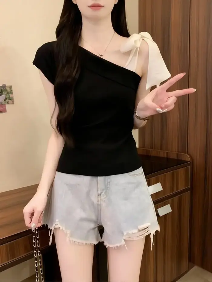 T-shirt élégant en tricot à nœud papillon pour femme