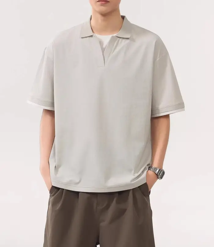 Polo homme 2026 à faux double col, coupe ample, décontracté et frais pour l'été, à manches courtes