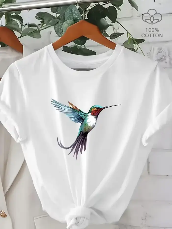 T-shirt unisexe décontracté en coton à col rond et manches courtes avec imprimé colibris aquarelle et accents floraux pour les amateurs d'oiseaux