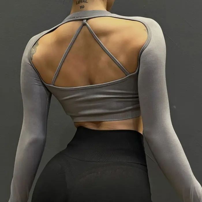 Haut court sans couture à manches longues pour femmes avec soutien-gorge rembourré fixe – Conception à dos croisé à séchage rapide pour le fitness et le yoga